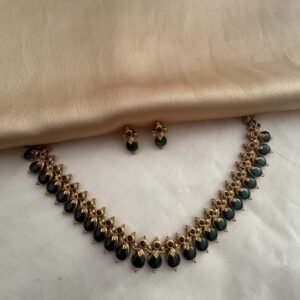 Gouri necklace 
Shade- Matte gold