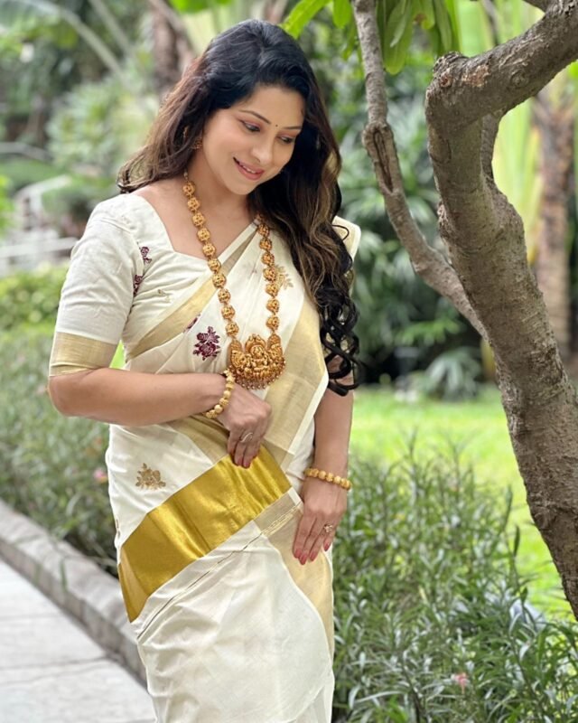 Rose embroidered cotton saree